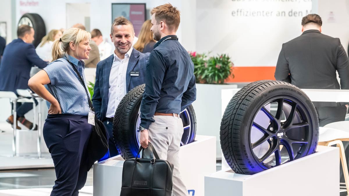 Visitors and exhibitors at the Falken stand